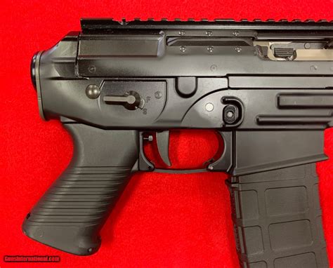 The flash suppressor uses a standard. . Sig p556 accessories